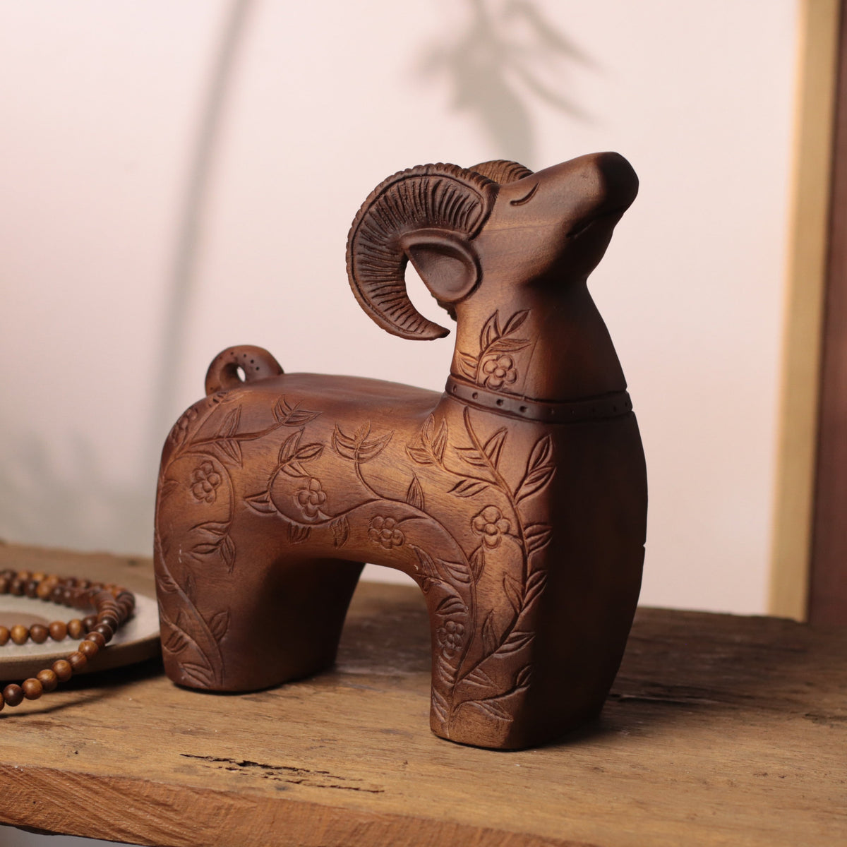 Floral Carved Goat Sculpture in Khaya Wood