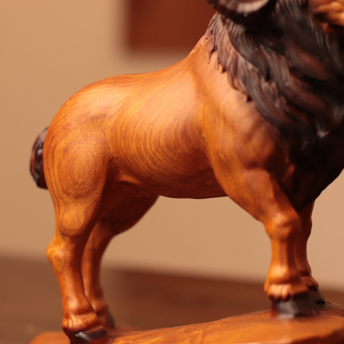 Spiral-Horn Goat on Rock in Padauk Wood