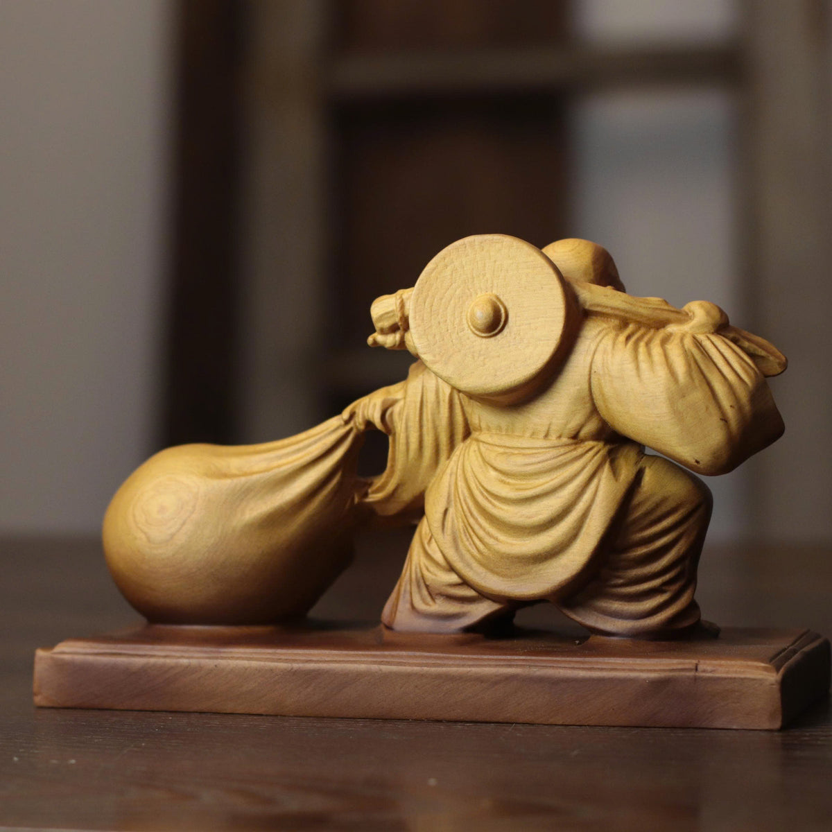 Laughing Buddha with Traveling Sack in Cypress Wood