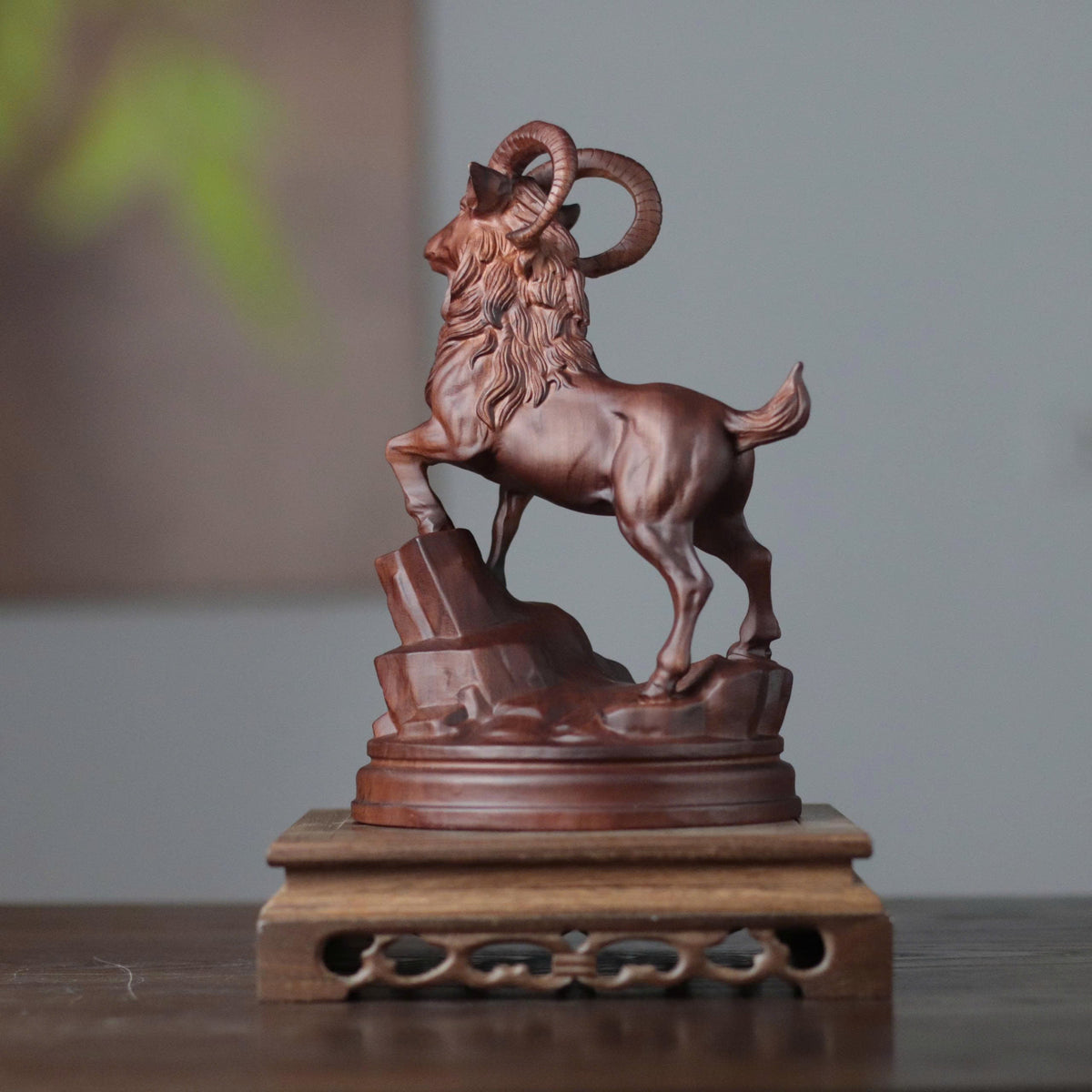 Raised-Head Goat on Rock in Padauk Wood