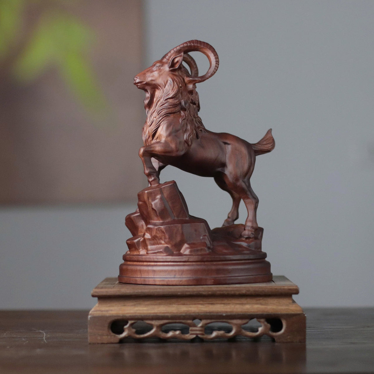 Raised-Head Goat on Rock in Padauk Wood