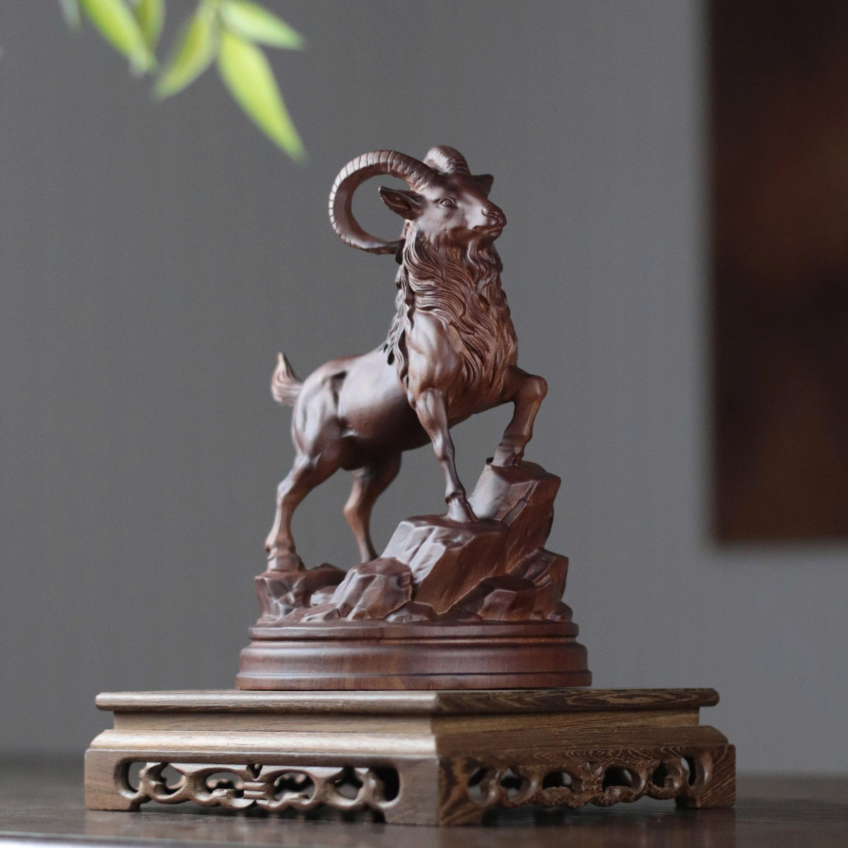 Raised-Head Goat on Rock in Padauk Wood