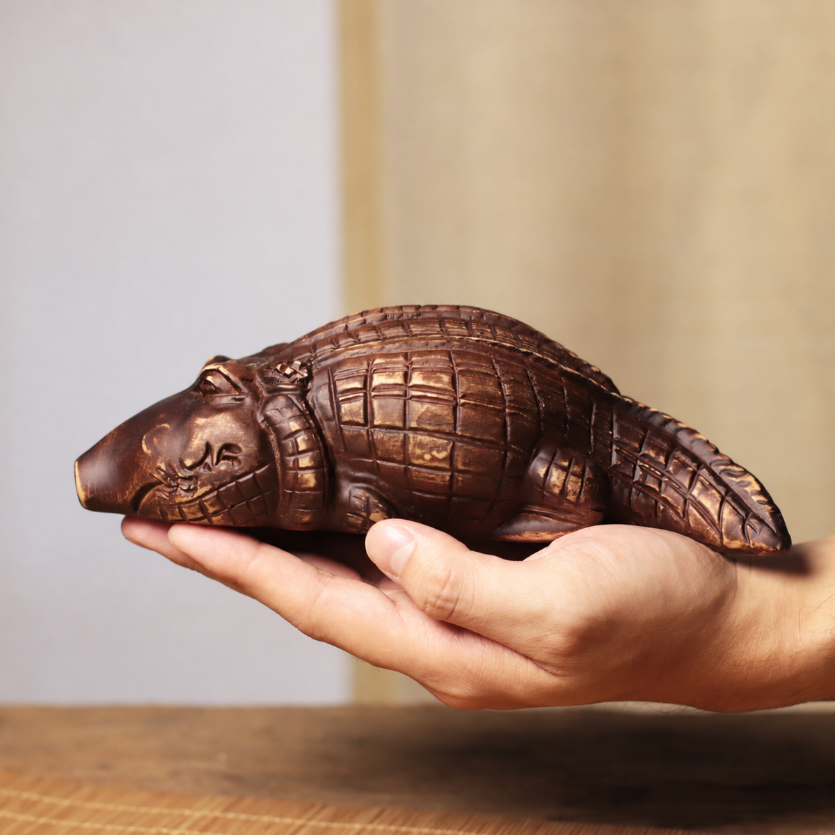 Rounded Crocodile Figurine in Khaya Wood