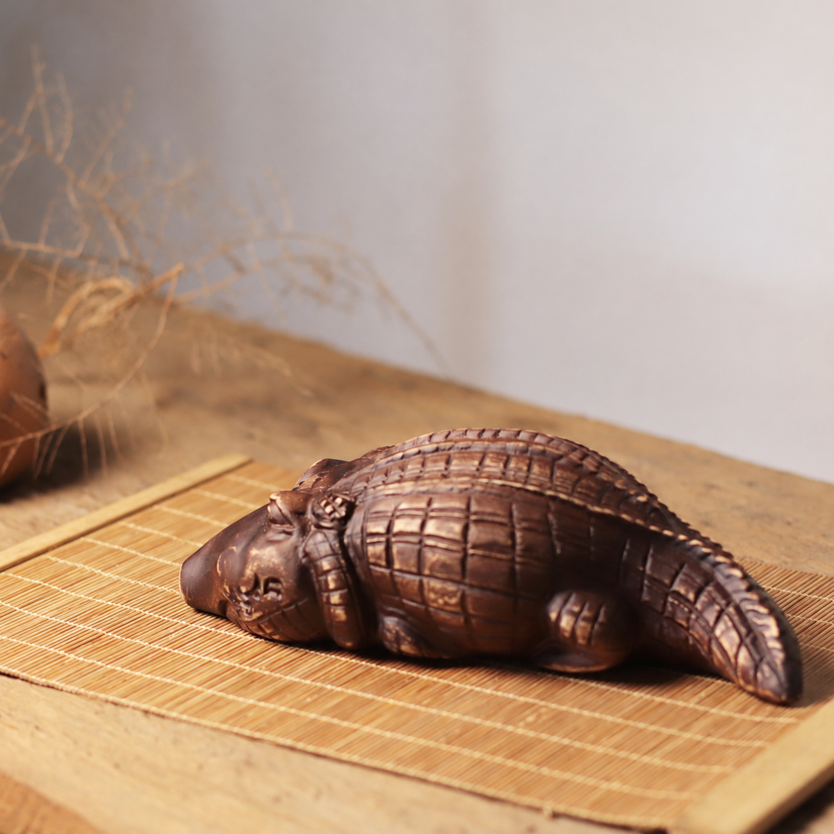 Rounded Crocodile Figurine in Khaya Wood