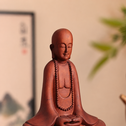 Meditating Zen Monk with Beads in Padauk Wood