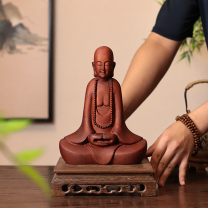 Meditating Zen Monk with Beads in Padauk Wood