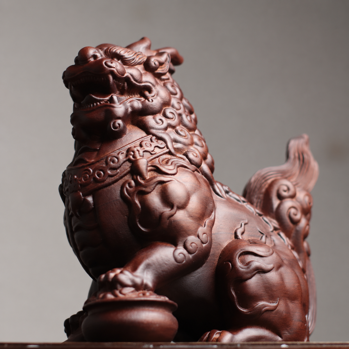 Qilin Guardian Statues in Padauk Wood — Product photo 5