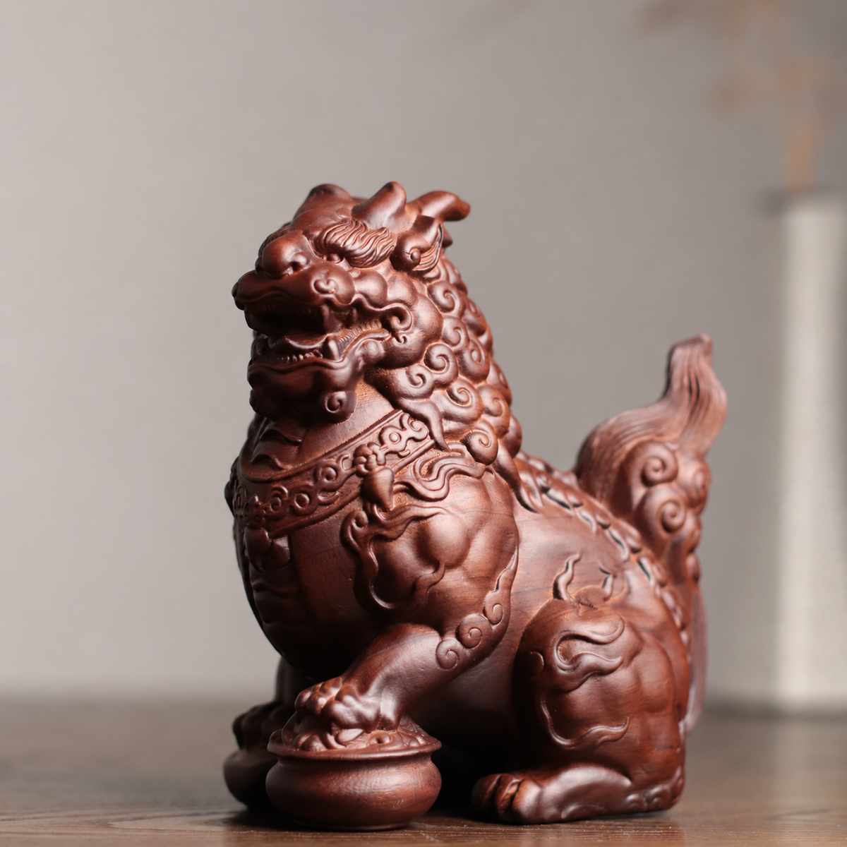 Qilin Guardian Statues in Padauk Wood — Product photo 1
