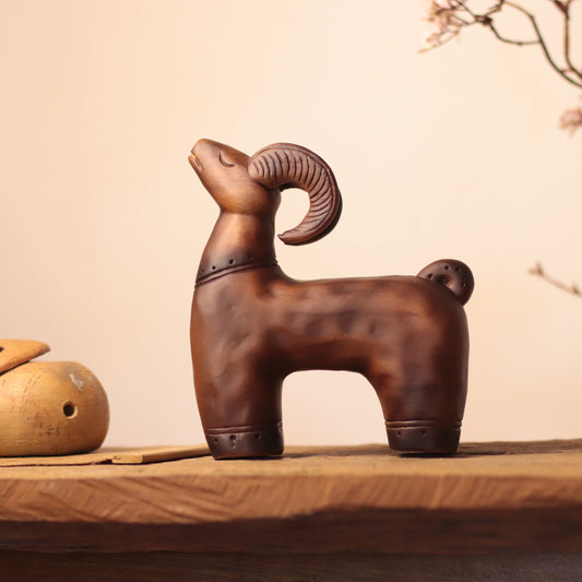 Resting-Eyed Goat Figurine in Khaya Wood