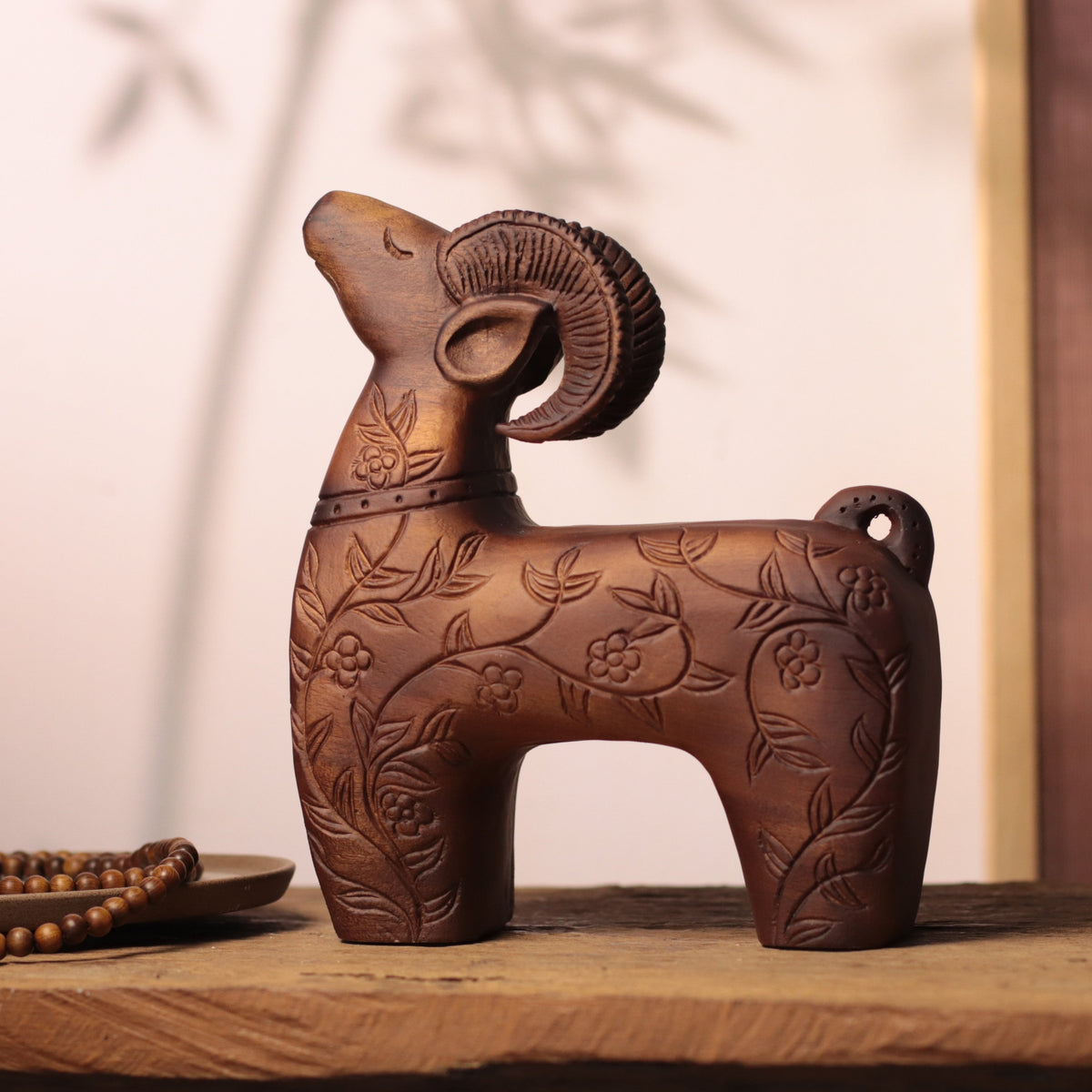 Floral Carved Goat Sculpture in Khaya Wood
