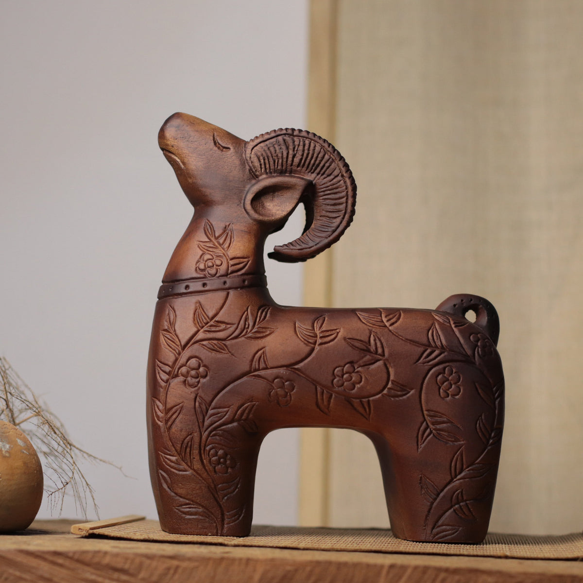 Floral Carved Goat Sculpture in Khaya Wood
