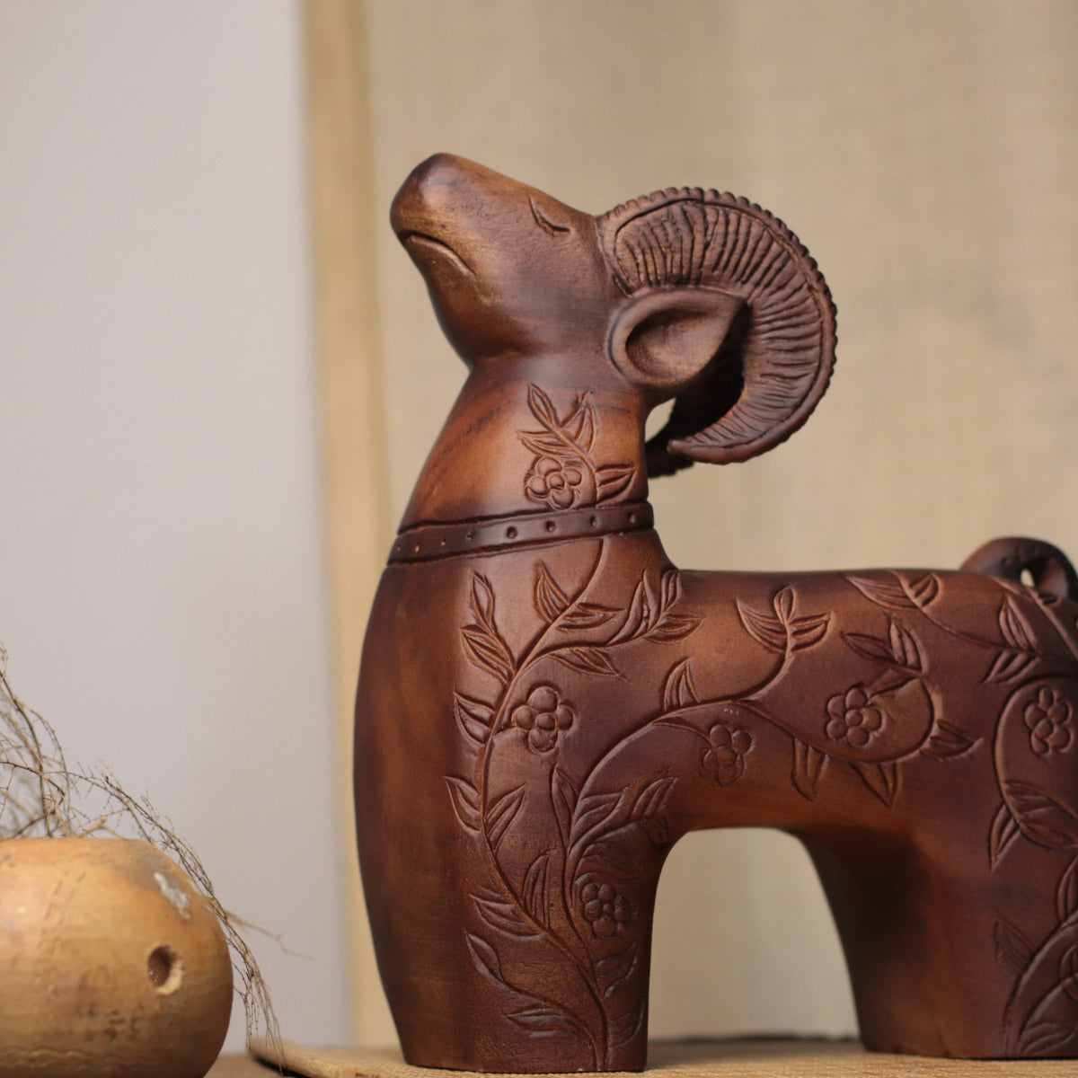 Floral Carved Goat Sculpture in Khaya Wood