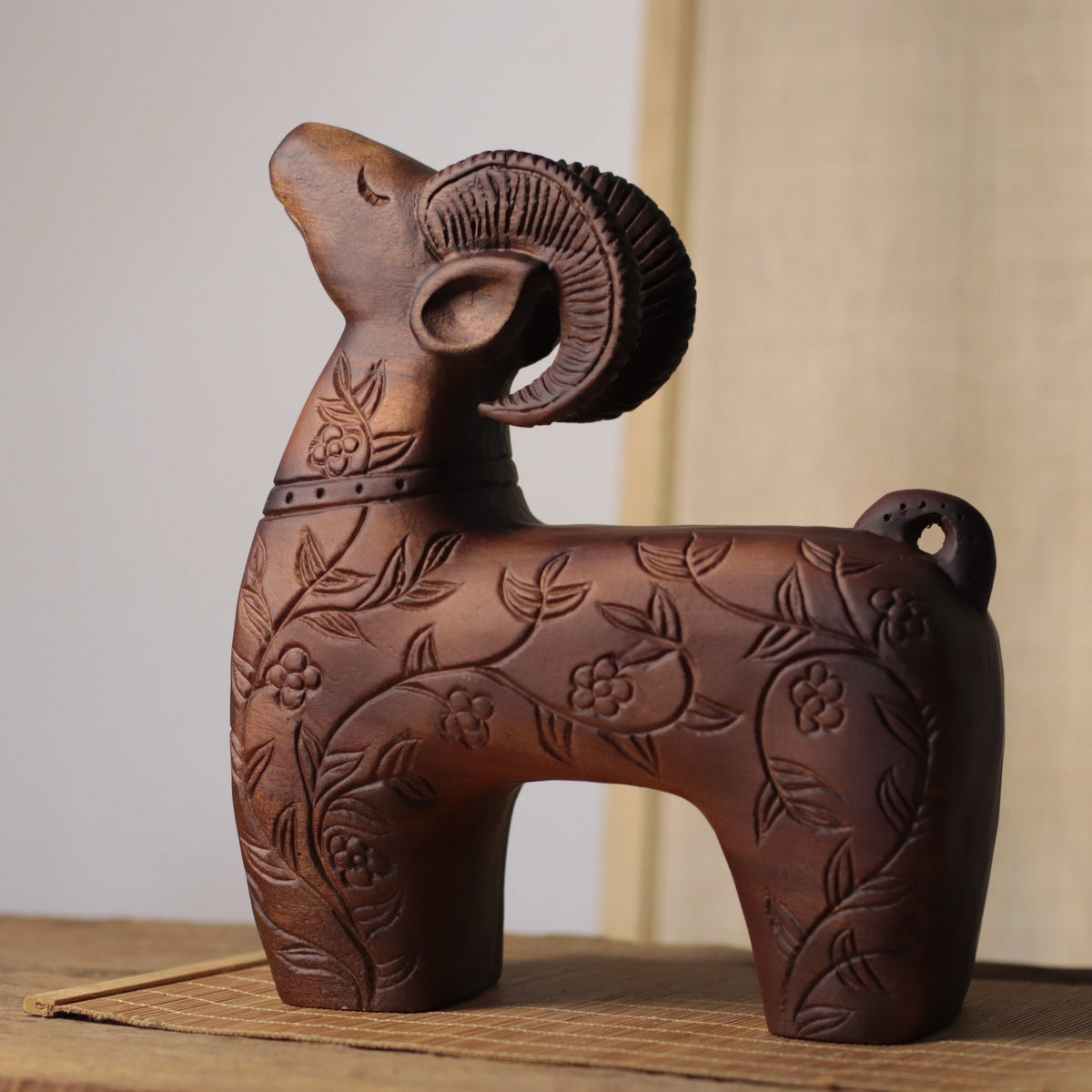Floral Carved Goat Sculpture in Khaya Wood