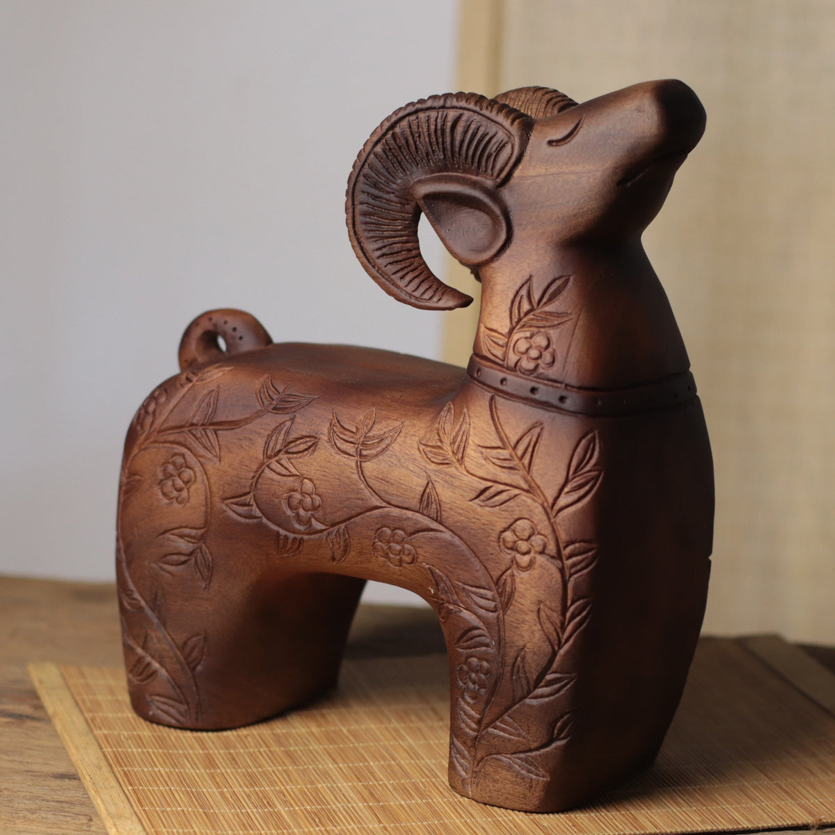 Floral Carved Goat Sculpture in Khaya Wood