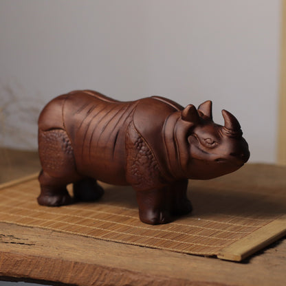 Hand-Carved Rhino Figurine in Khaya Wood