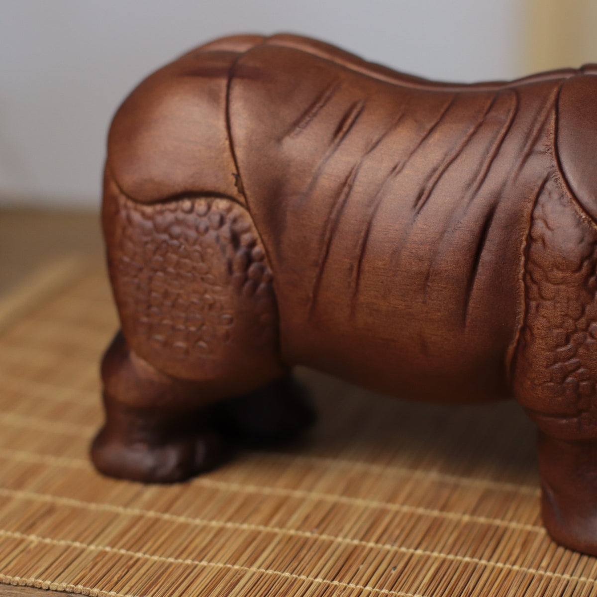 Hand-Carved Rhino Figurine in Khaya Wood