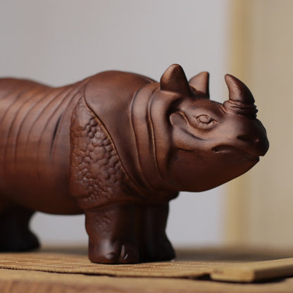 Hand-Carved Rhino Figurine in Khaya Wood