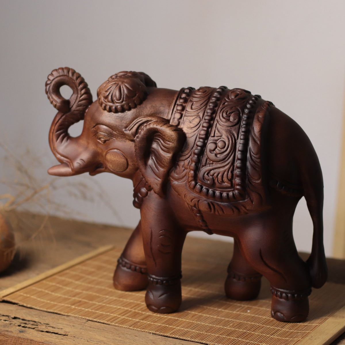 Raised-Trunk Elephant Sculpture in Khaya Wood