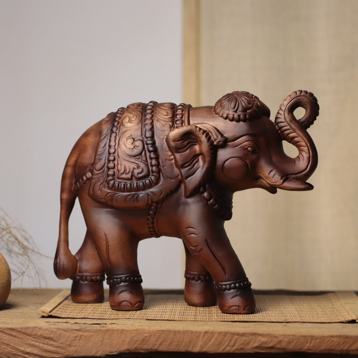 Raised-Trunk Elephant Sculpture in Khaya Wood