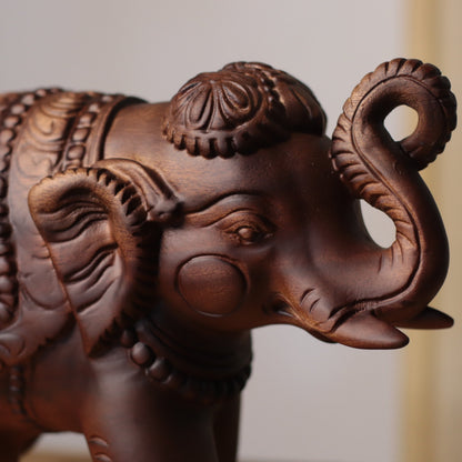 Raised-Trunk Elephant Sculpture in Khaya Wood