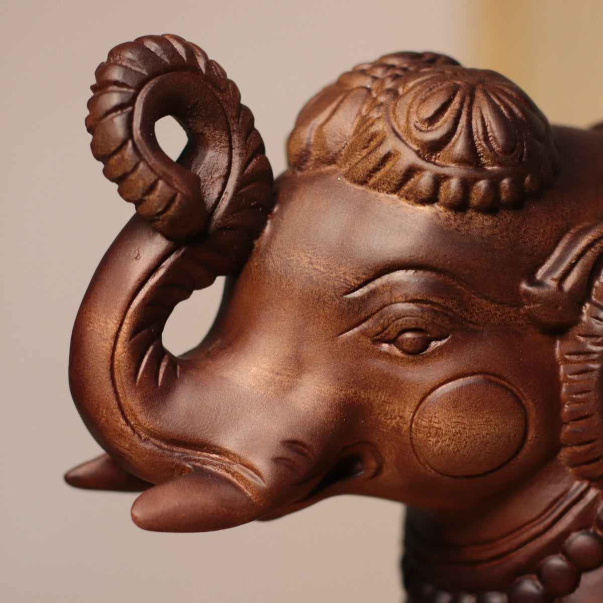 Raised-Trunk Elephant Sculpture in Khaya Wood