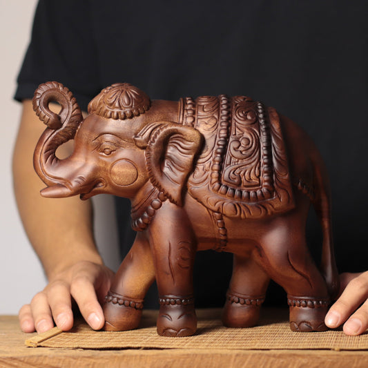 Raised-Trunk Elephant Sculpture in Khaya Wood