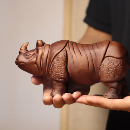 Hand-Carved Rhino Figurine in Khaya Wood