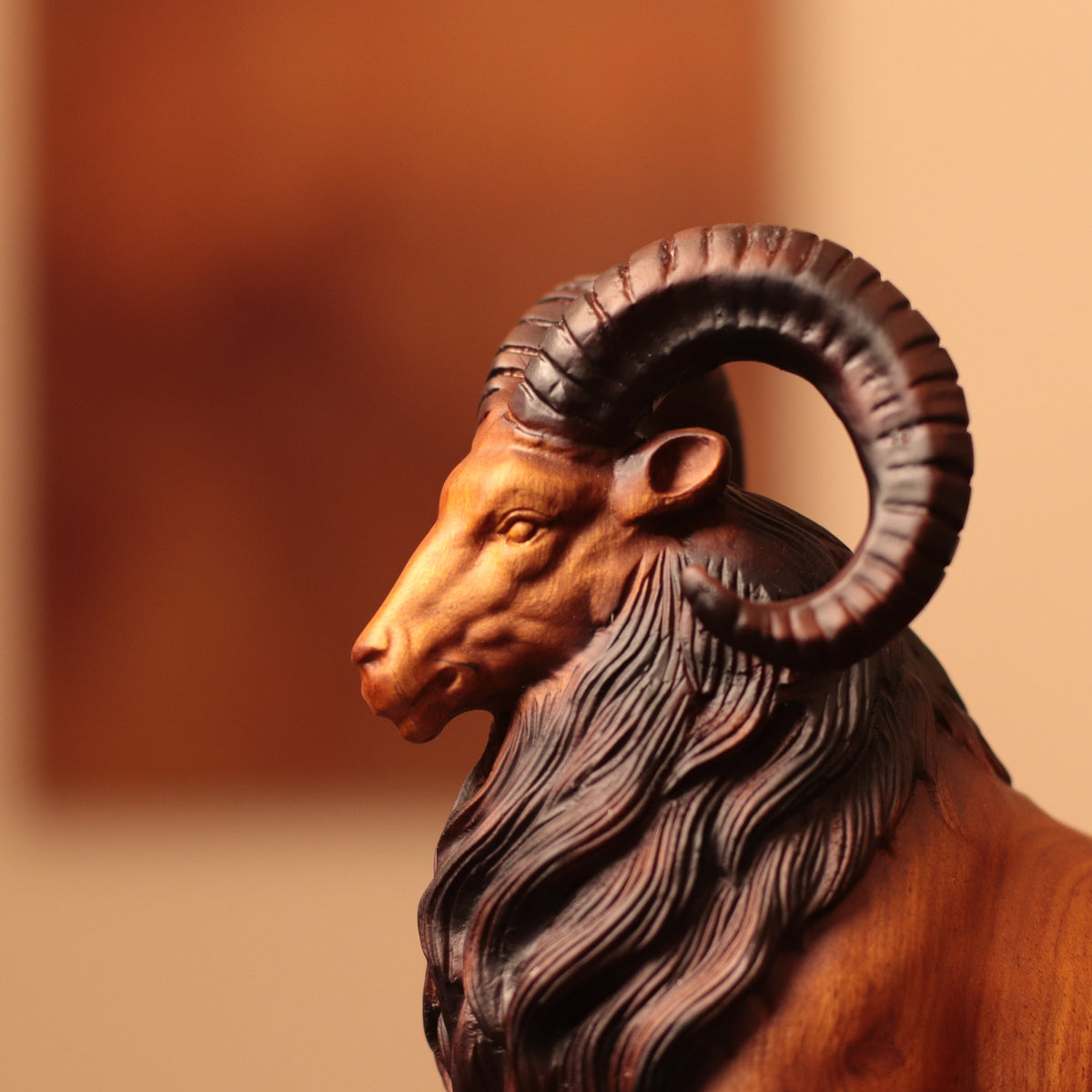 Spiral-Horn Goat on Rock in Padauk Wood
