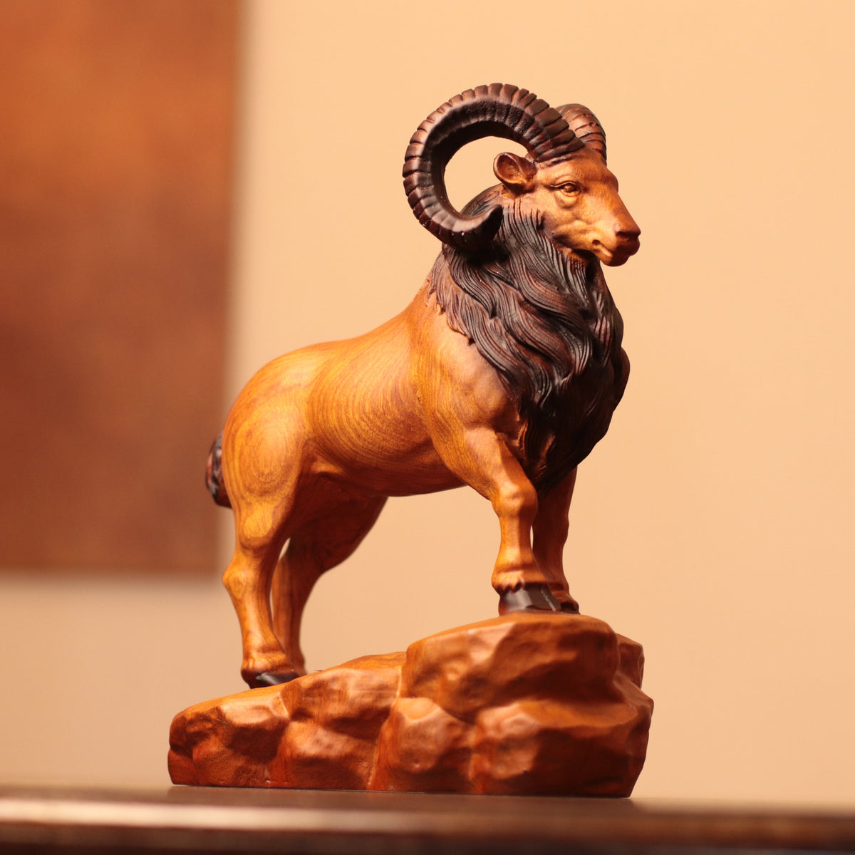 Spiral-Horn Goat on Rock in Padauk Wood
