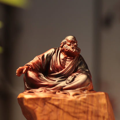 Bodhidharma on Rock Seat in Padauk Wood