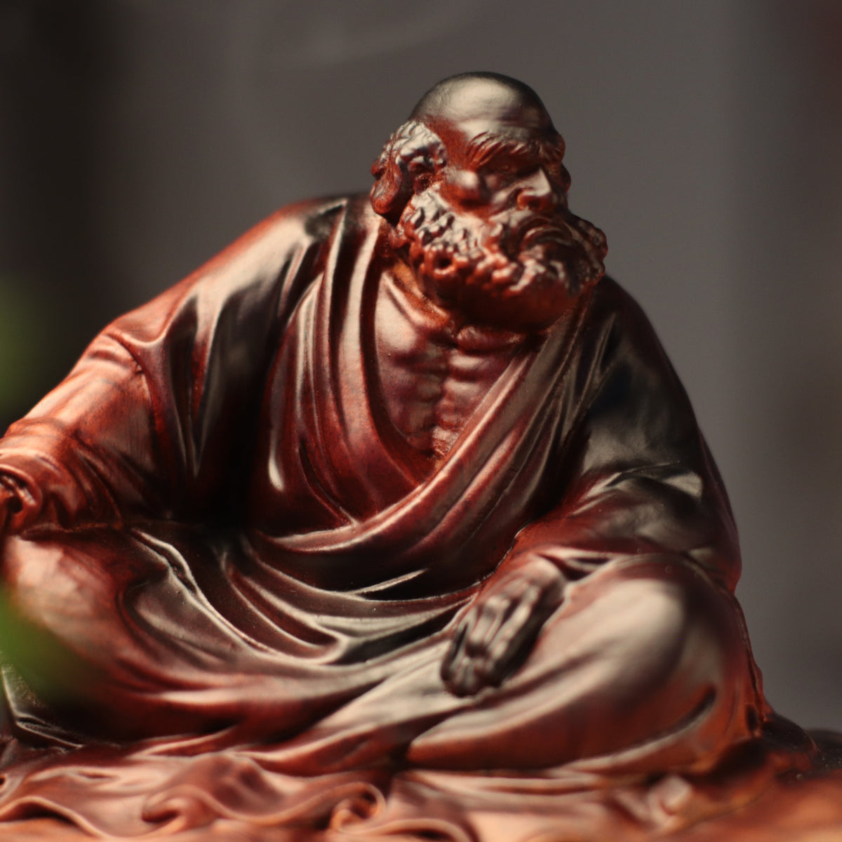 Bodhidharma on Rock Seat in Padauk Wood